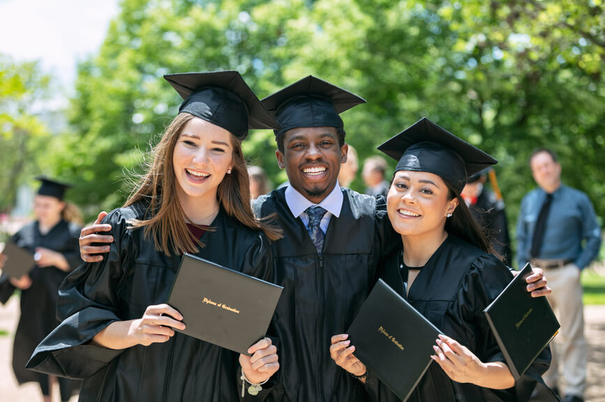 students in caps and gowns